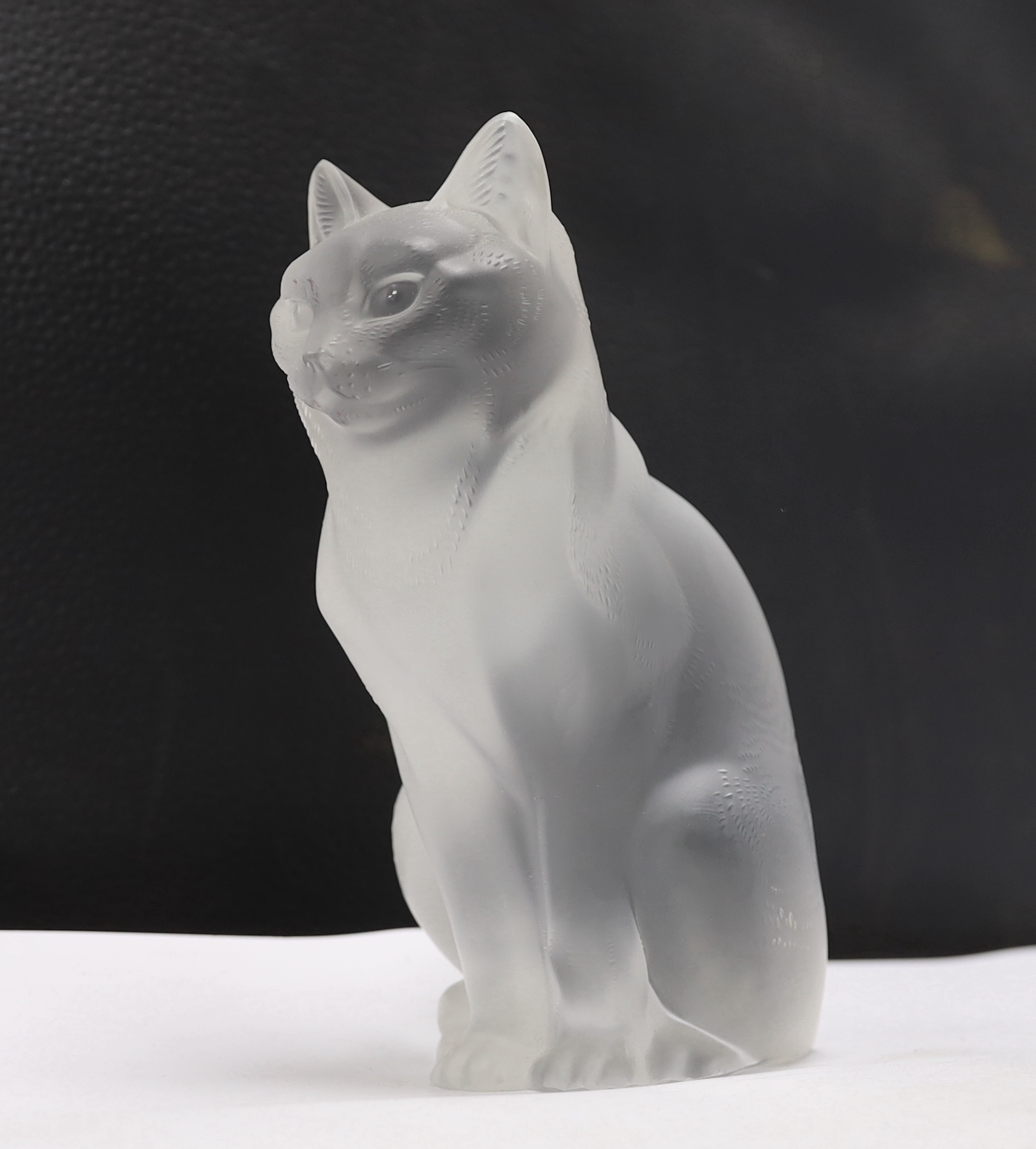 A Lalique glass seated cat, signed to the base, 20cm high